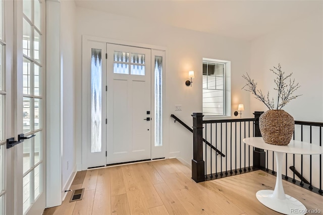 668 Leafy Aster Ln, Castle Rock, CO 80104 - foyer with light wood finished floors and baseboards