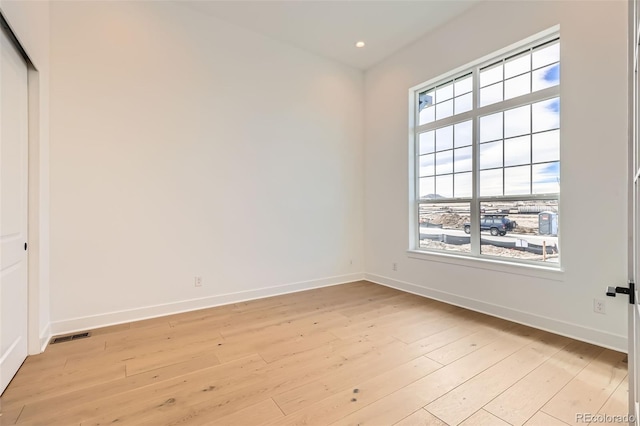 668 Leafy Aster Ln, Castle Rock, CO 80104 - empty room with light wood finished floors, baseboards, and recessed lighting