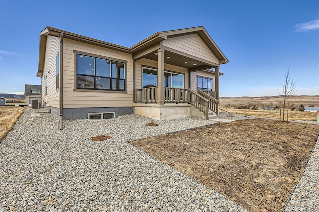 668 Leafy Aster Ln, Castle Rock, CO 80104 - view of front of house with covered porch and central AC unit