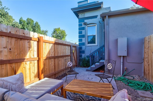 1739 E Martin Luther King Jr Blvd, Denver, CO 80205 - fenced backyard featuring a patio area and an outdoor hangout area