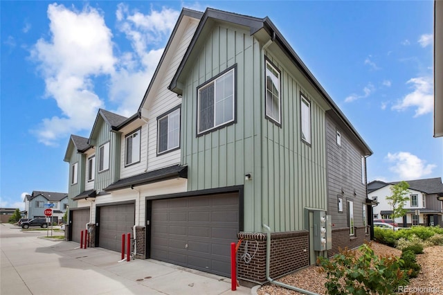 view of property exterior with a garage