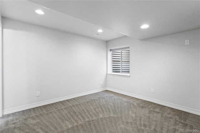 spare room with carpet flooring