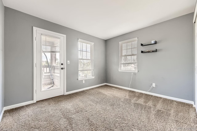 12824 Ironstone Way Unit 303, Parker, CO 80134 - carpeted empty room with baseboards