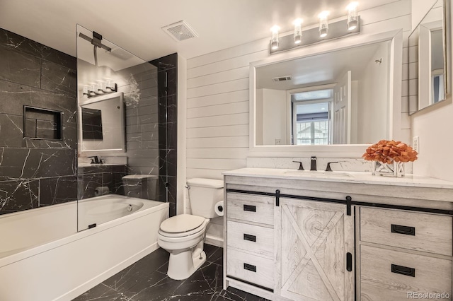 12824 Ironstone Way Unit 303, Parker, CO 80134 - bathroom with marble look tile flooring, vanity,  shower combination, and wooden walls