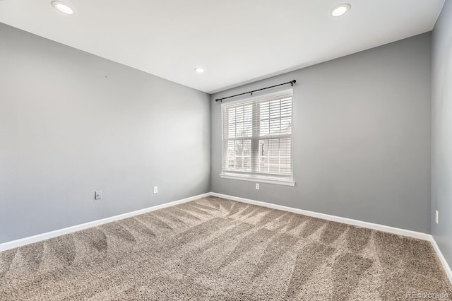 12824 Ironstone Way Unit 303, Parker, CO 80134 - unfurnished room featuring carpet floors and recessed lighting