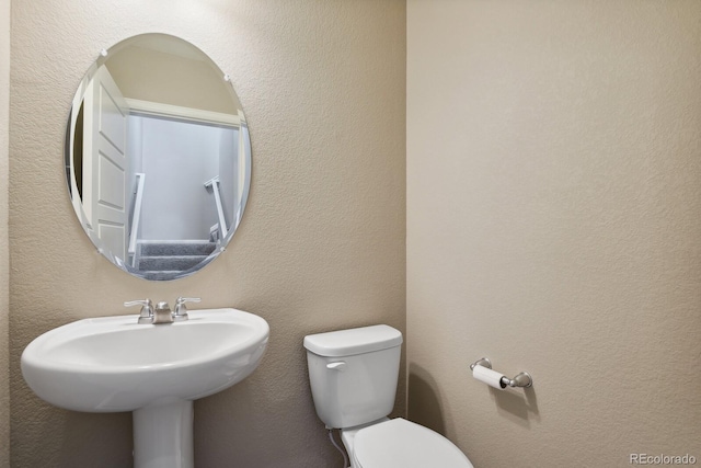 bathroom featuring toilet