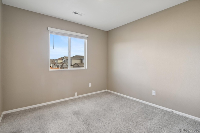 view of carpeted spare room