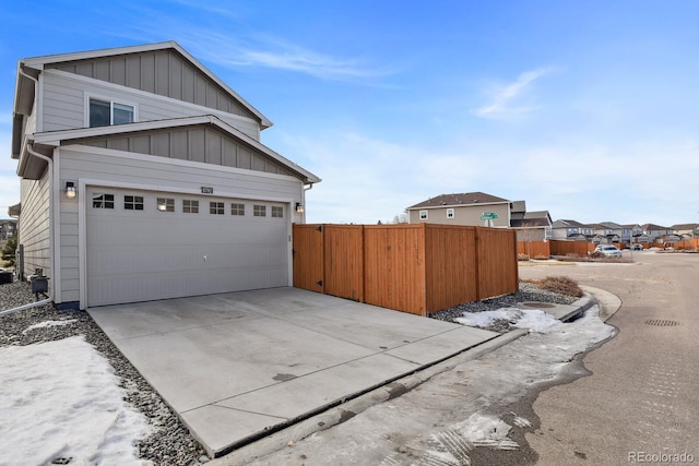 view of side of property with a garage