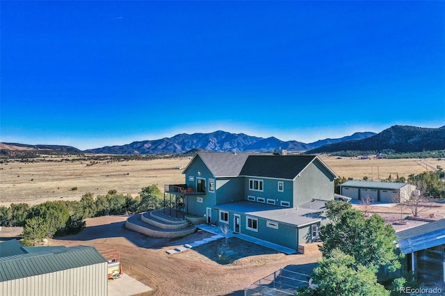 exterior space with a mountain view