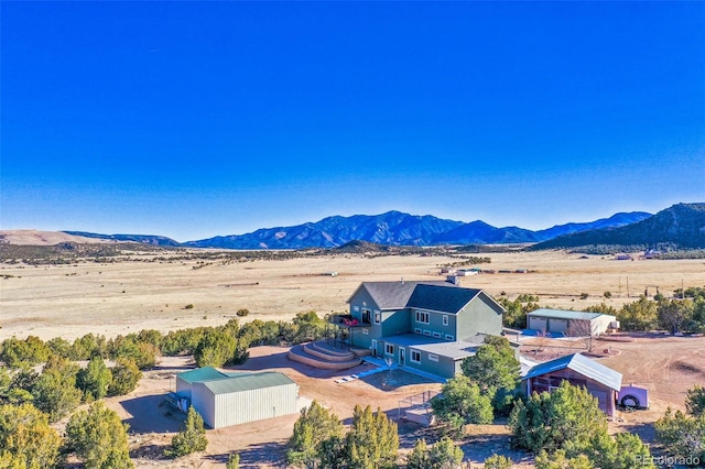 bird's eye view featuring view of desert and a mountain view