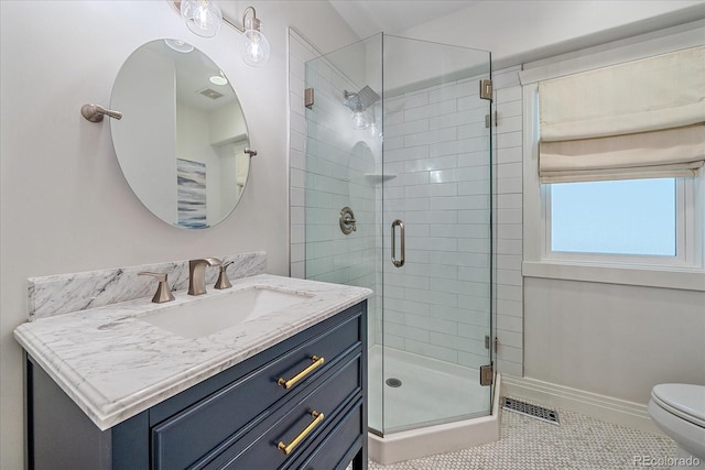 2340 S Columbine St, Denver, CO 80210 - bathroom featuring vanity, a stall shower, and tile patterned floors
