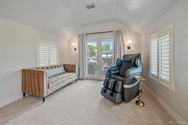 2340 S Columbine St, Denver, CO 80210 - living room with light carpet, french doors, and lofted ceiling
