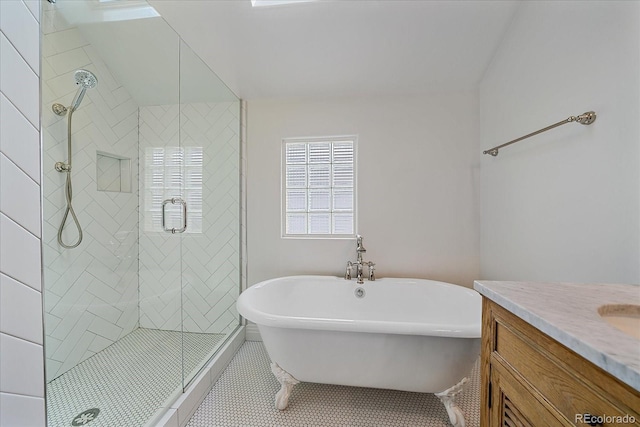 2340 S Columbine St, Denver, CO 80210 - full bath with a freestanding bath, a shower stall, vanity, and tile patterned floors