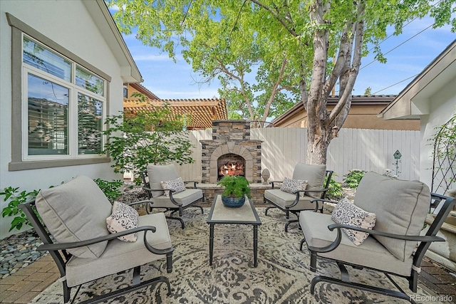 2340 S Columbine St, Denver, CO 80210 - view of patio / terrace featuring an outdoor living space with a fireplace