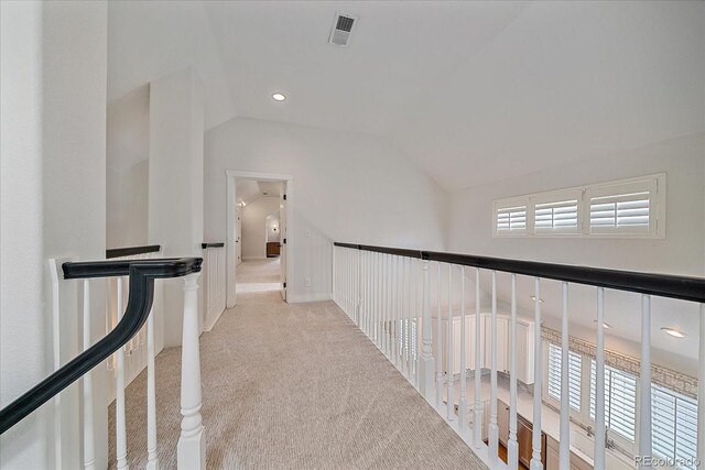 2340 S Columbine St, Denver, CO 80210 - hallway with lofted ceiling, carpet flooring, and recessed lighting