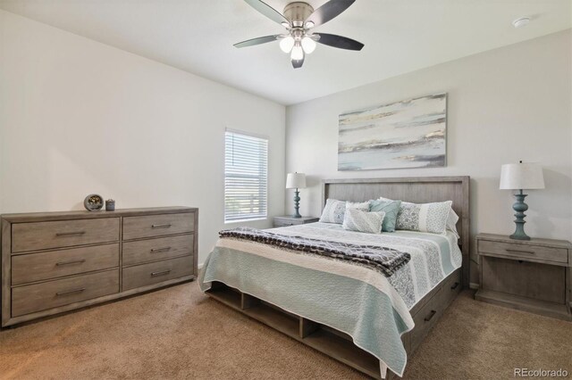 carpeted bedroom with ceiling fan