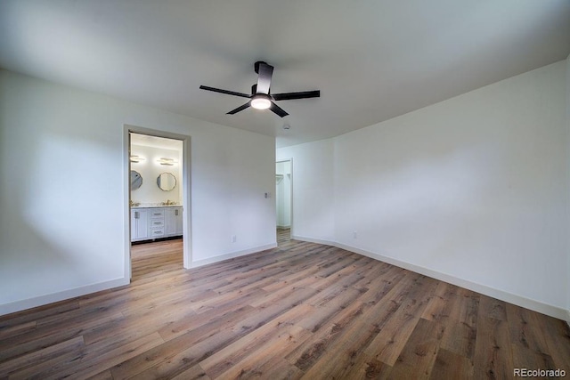 1815 S Monroe St, Denver, CO 80210 - unfurnished bedroom featuring wood finished floors and ceiling fan
