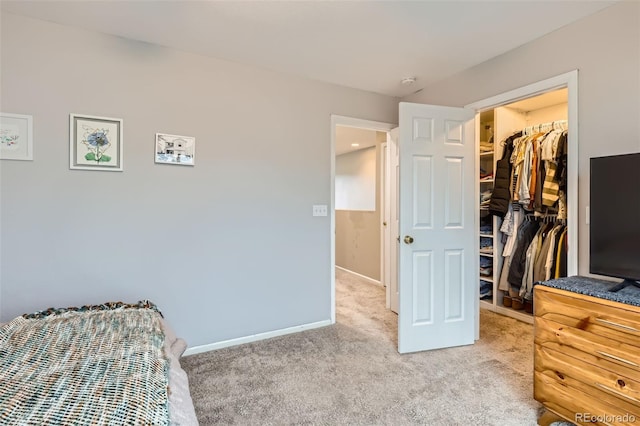 10700 Kimblewyck Cir Unit 155, Northglenn, CO 80233 - carpeted bedroom with a walk in closet and a closet