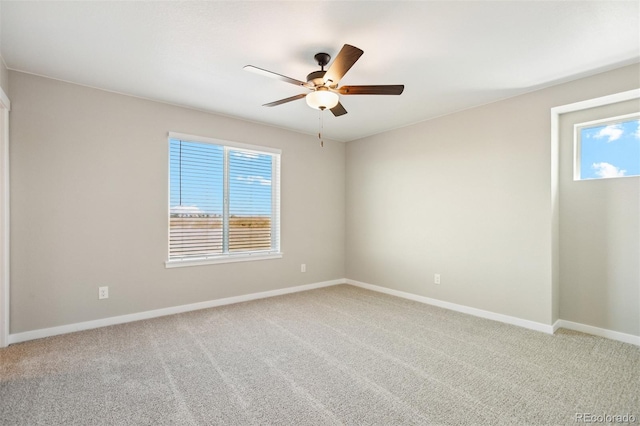 9456 Yampa Ct, Commerce City, CO 80022 - unfurnished room with light carpet, baseboards, and a ceiling fan