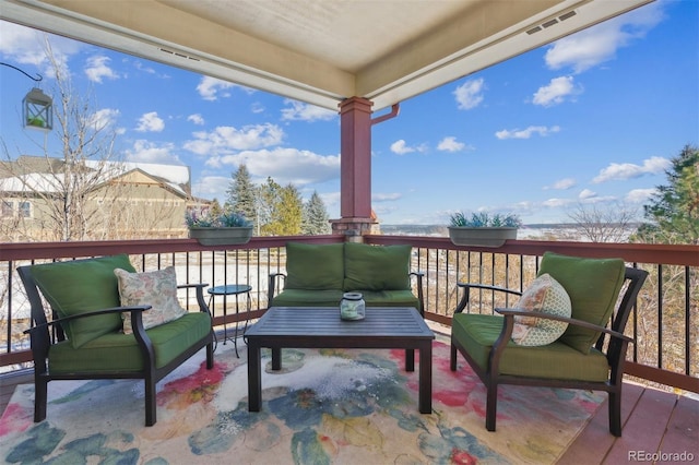 balcony with an outdoor hangout area