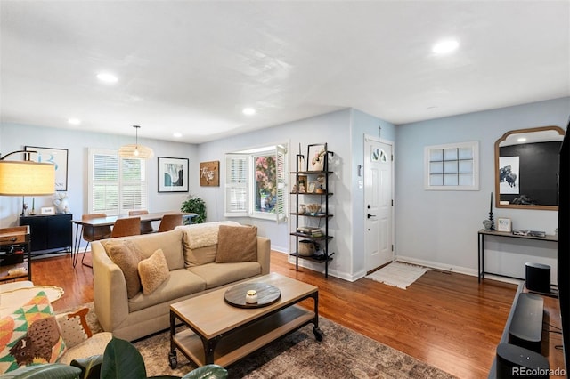 2309 Magellan St, Colorado Springs, CO 80907 - living area featuring wood finished floors and recessed lighting