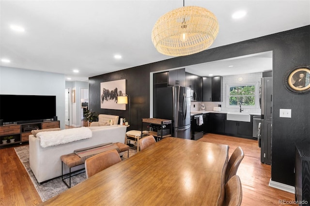 2309 Magellan St, Colorado Springs, CO 80907 - dining area featuring light wood-style floors and recessed lighting