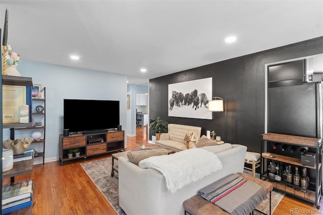 2309 Magellan St, Colorado Springs, CO 80907 - living room featuring wood finished floors and recessed lighting