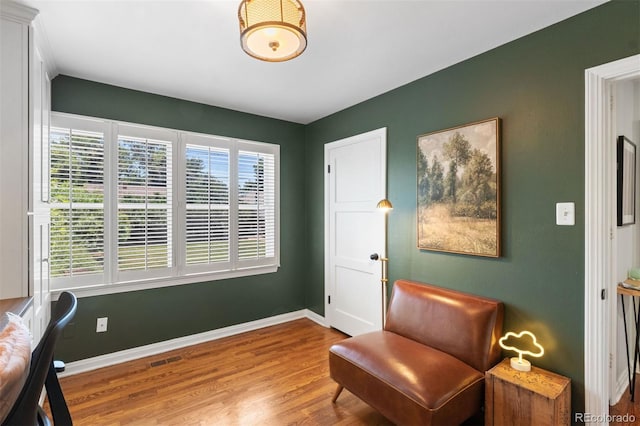 2309 Magellan St, Colorado Springs, CO 80907 - sitting room featuring wood finished floors and baseboards