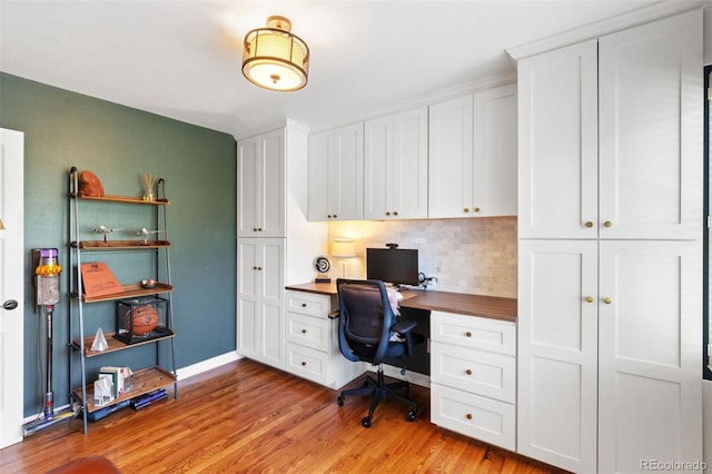 2309 Magellan St, Colorado Springs, CO 80907 - office featuring built in study area and light wood-style flooring