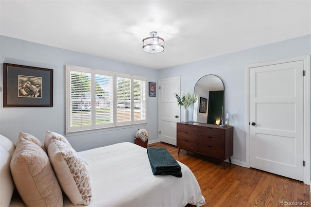 2309 Magellan St, Colorado Springs, CO 80907 - bedroom with wood finished floors and baseboards