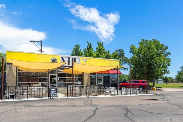 2309 Magellan St, Colorado Springs, CO 80907 - view of building exterior featuring uncovered parking