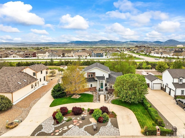 aerial perspective of suburban area featuring mountains