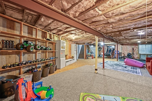 unfinished basement featuring stairs