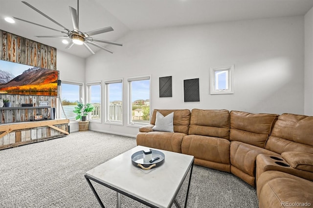 living area featuring ceiling fan, carpet floors, healthy amount of natural light, recessed lighting, and high vaulted ceiling