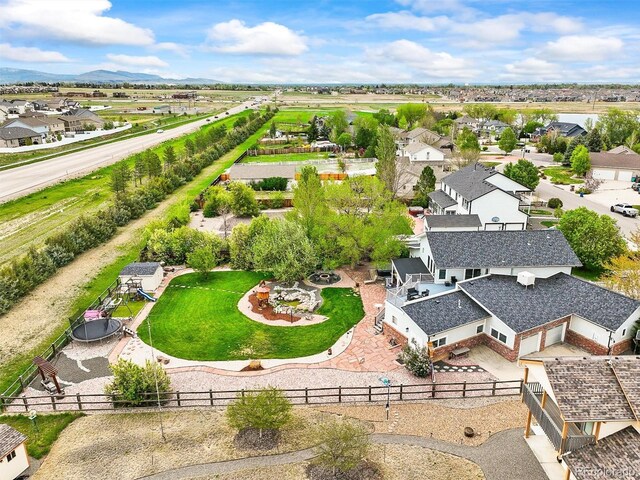 aerial view of residential area featuring a mountain backdrop