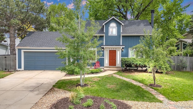 1304 Ceres Dr, Lafayette, CO 80026 - traditional-style home with driveway, a garage, and a shingled roof