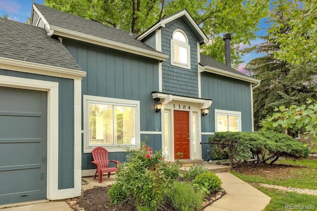 1304 Ceres Dr, Lafayette, CO 80026 - property entrance with a shingled roof