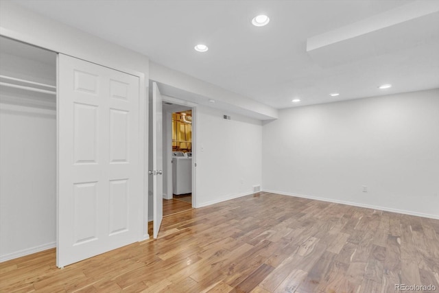 1304 Ceres Dr, Lafayette, CO 80026 - finished basement with washer / clothes dryer, light wood-style flooring, recessed lighting, and baseboards