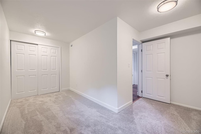 1304 Ceres Dr, Lafayette, CO 80026 - unfurnished bedroom featuring carpet floors, baseboards, and a closet