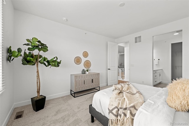 8242 S Pierson St, Littleton, CO 80127 - bedroom featuring light colored carpet, visible vents, and baseboards