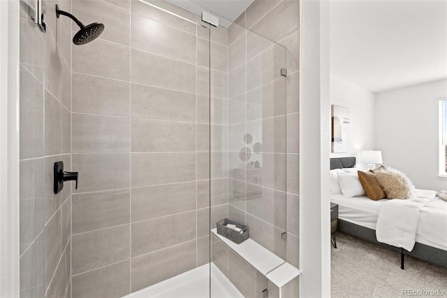 8242 S Pierson St, Littleton, CO 80127 - bathroom featuring tiled shower and ensuite bath
