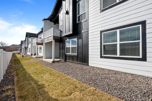 8242 S Pierson St, Littleton, CO 80127 - exterior space with fence and a balcony