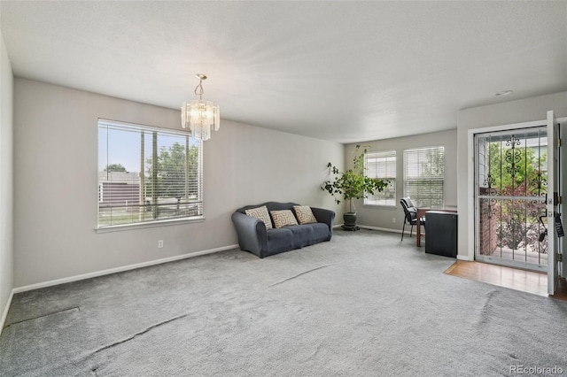 13802 Jasmine St, Thornton, CO 80602 - living area featuring carpet flooring and a chandelier