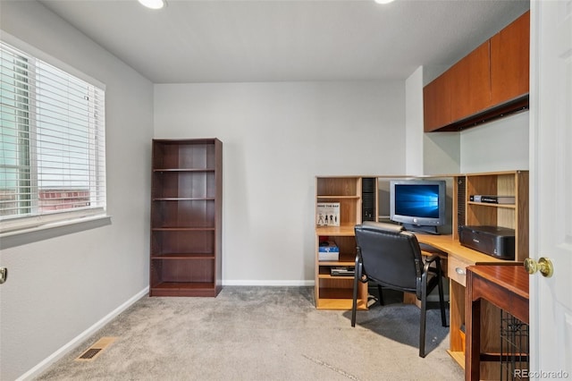 13802 Jasmine St, Thornton, CO 80602 - home office featuring light colored carpet and recessed lighting