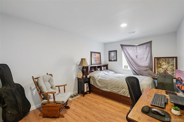 13802 Jasmine St, Thornton, CO 80602 - bedroom featuring light wood-style flooring, an office area, and recessed lighting