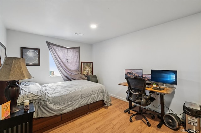 13802 Jasmine St, Thornton, CO 80602 - bedroom with wood finished floors, recessed lighting, and a desk
