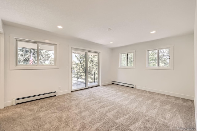 12196 W Belleview Dr, Littleton, CO 80127 - spare room with a baseboard radiator, light carpet, recessed lighting, and baseboards