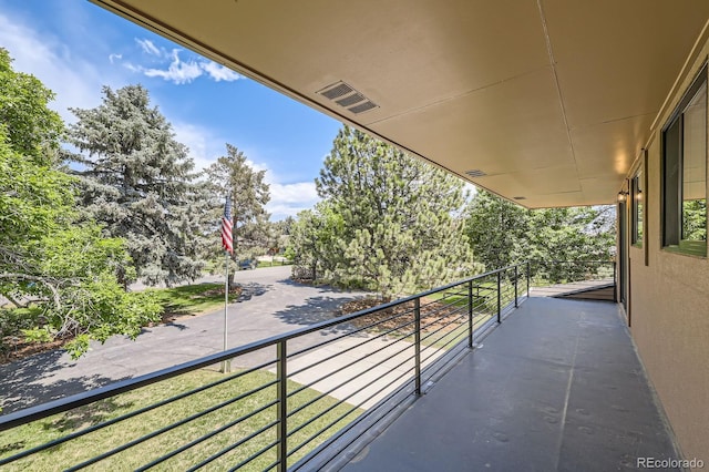 12196 W Belleview Dr, Littleton, CO 80127 - balcony with view of scattered trees