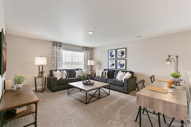 living room featuring light carpet