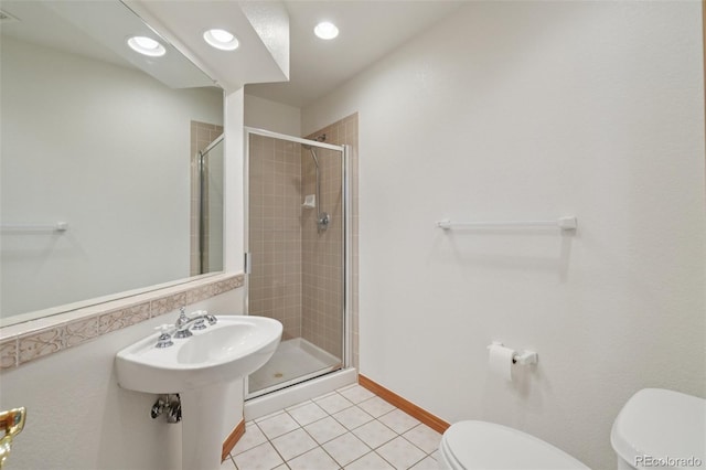 2247 Eagles Nest Dr, Lafayette, CO 80026 - full bathroom featuring a stall shower, tile patterned floors, and recessed lighting